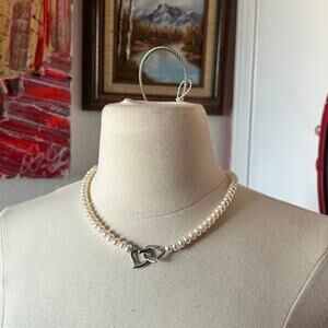 white pearl necklace with silver heart charm